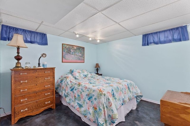 bedroom featuring a paneled ceiling