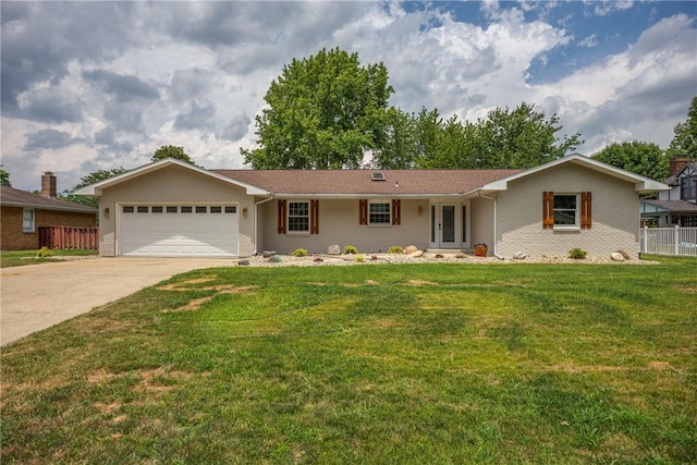 ranch-style house with a garage and driveway