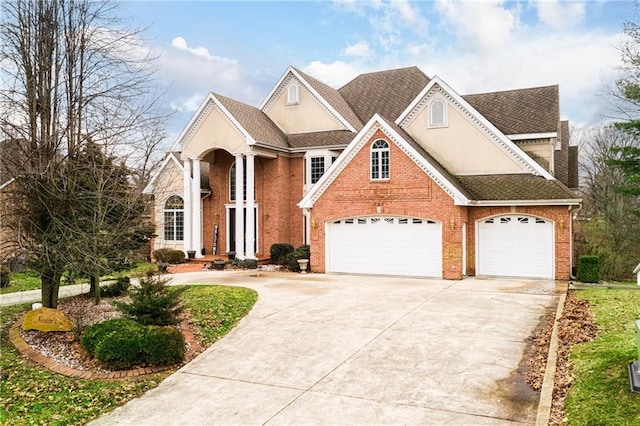 view of front of home with a garage