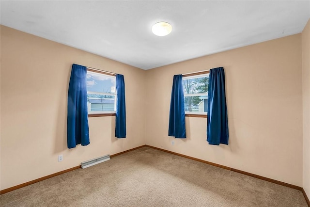 view of carpeted spare room