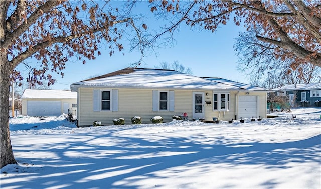 ranch-style house featuring a garage