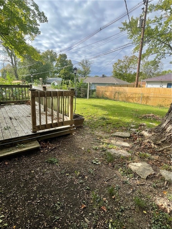 view of yard with a wooden deck