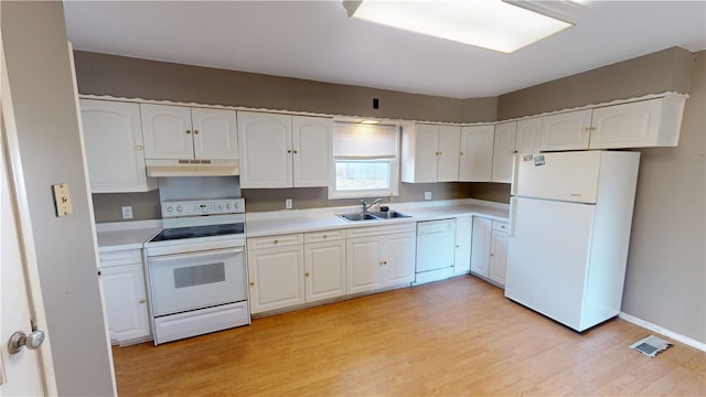 kitchen with white cabinetry, sink, white appliances, and light wood-type flooring