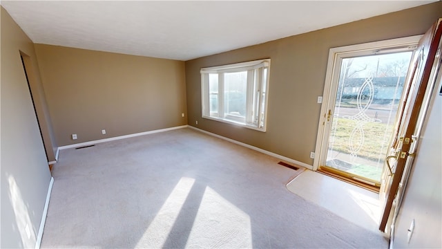 interior space featuring light colored carpet