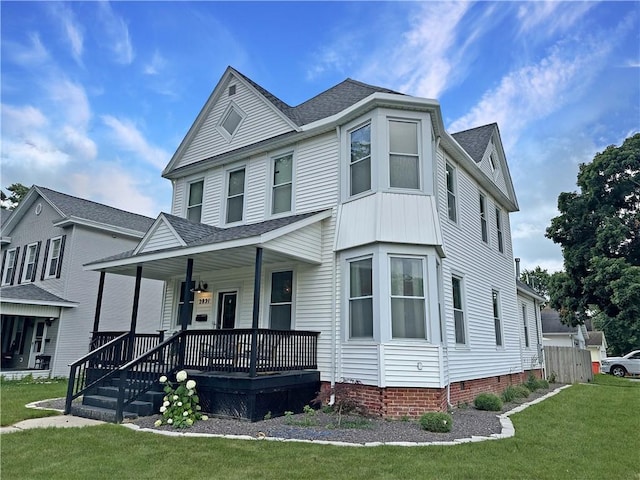2821 Western Ave, Mattoon, IL 61938 - view of front facade featuring a shingled roof, a porch, and a front yard