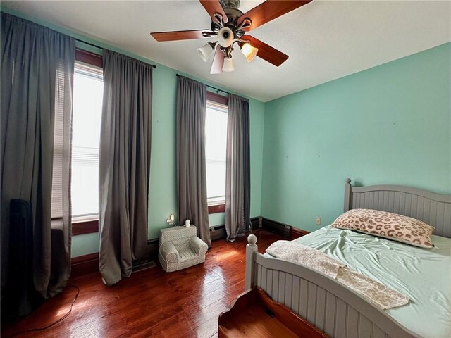 2821 Western Ave, Mattoon, IL 61938 - bedroom featuring wood finished floors and ceiling fan