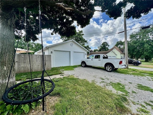 2821 Western Ave, Mattoon, IL 61938 - view of yard featuring a detached garage and an outbuilding
