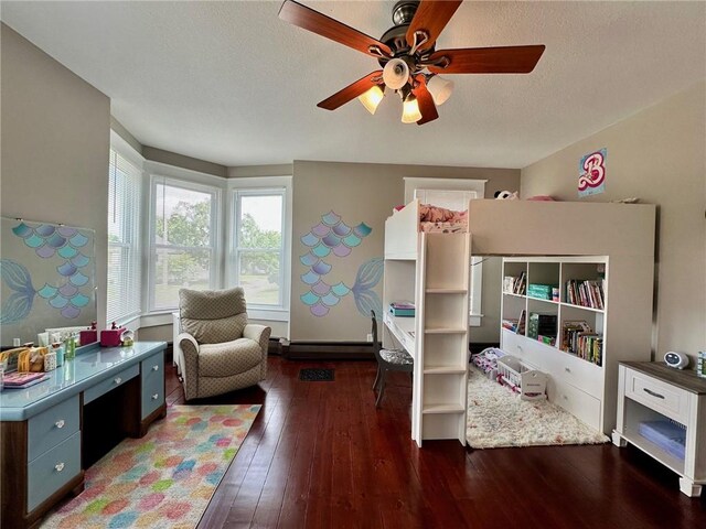 2821 Western Ave, Mattoon, IL 61938 - bedroom featuring hardwood / wood-style floors, a ceiling fan, and a textured ceiling
