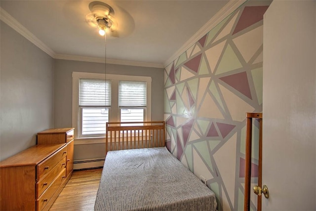 236 N Dennis Ave, Decatur, IL 62522 - bedroom featuring a baseboard radiator, light wood-style floors, and crown molding