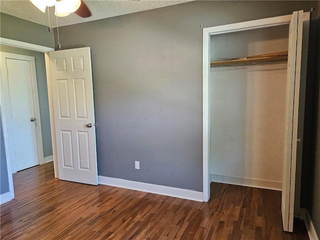241 S Main St, Argenta, IL 62501 - unfurnished bedroom featuring wood finished floors and a closet