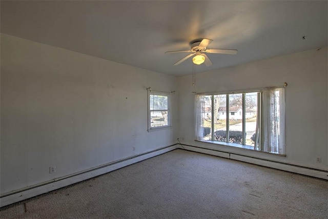 unfurnished room featuring a ceiling fan and carpet floors