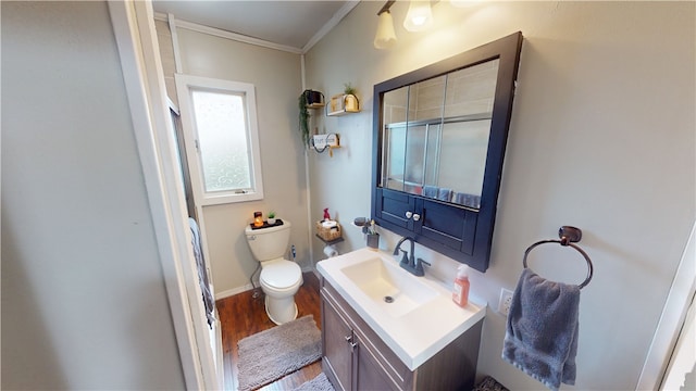 215 E Winter Ave, Danville, IL 61832 - bathroom with vanity, crown molding, wood finished floors, and a shower