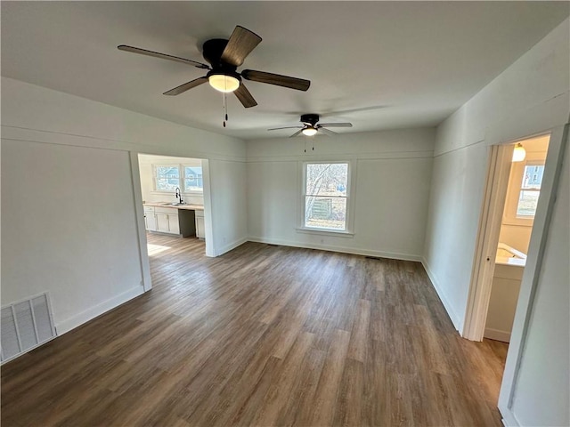 interior space featuring sink and hardwood / wood-style flooring