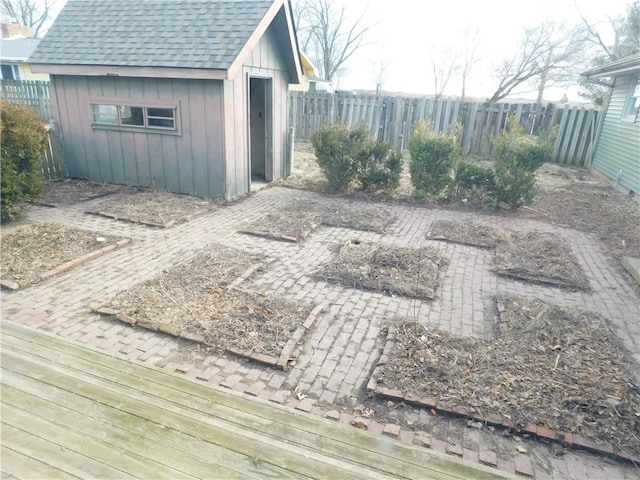 view of shed featuring a fenced backyard