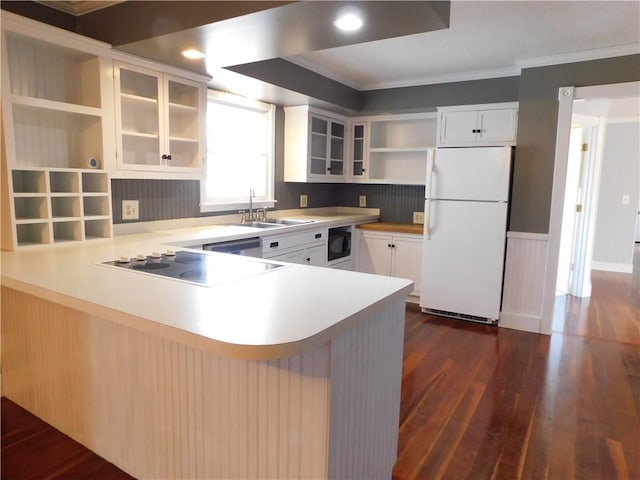 kitchen featuring a peninsula, dark wood-type flooring, open shelves, a sink, and black appliances