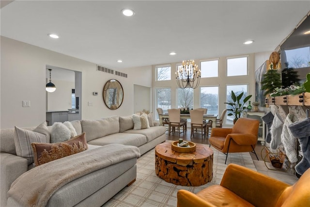 living room with a notable chandelier