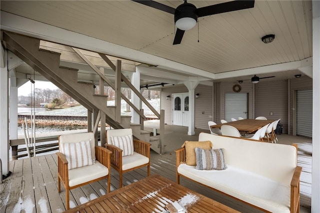 deck with ceiling fan and an outdoor hangout area