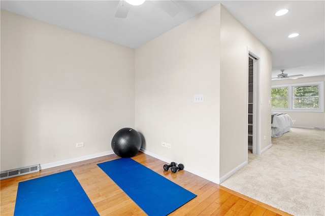 exercise area featuring baseboards, ceiling fan, recessed lighting, and visible vents