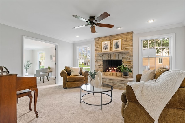 living area with light colored carpet, ornamental molding, ceiling fan, and recessed lighting