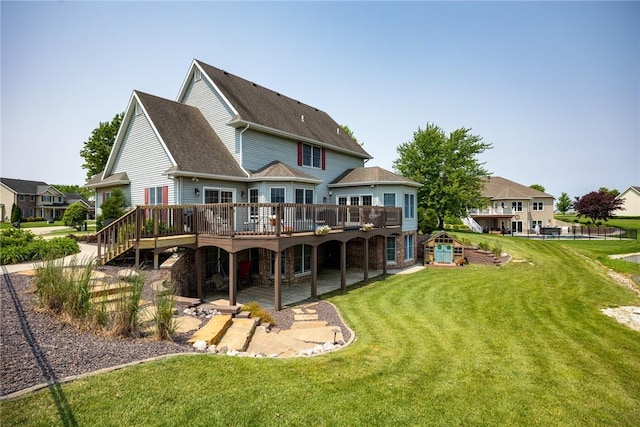 11154 E Ravenwood Ct, Effingham, IL 62401 - rear view of property with a deck, a lawn, a patio area, and stairway