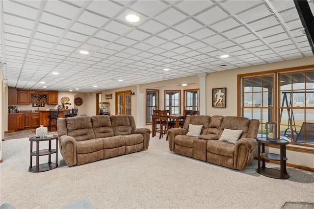 11154 E Ravenwood Ct, Effingham, IL 62401 - living area featuring light carpet, recessed lighting, and bar area