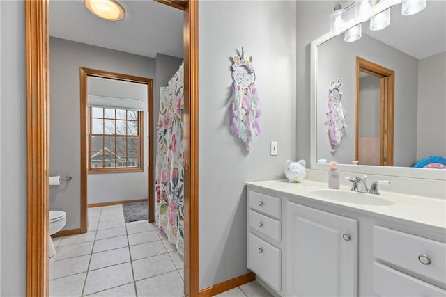 11154 E Ravenwood Ct, Effingham, IL 62401 - bathroom featuring vanity, tile patterned floors, and curtained shower