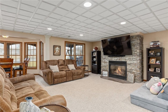11154 E Ravenwood Ct, Effingham, IL 62401 - carpeted living room with a fireplace and recessed lighting