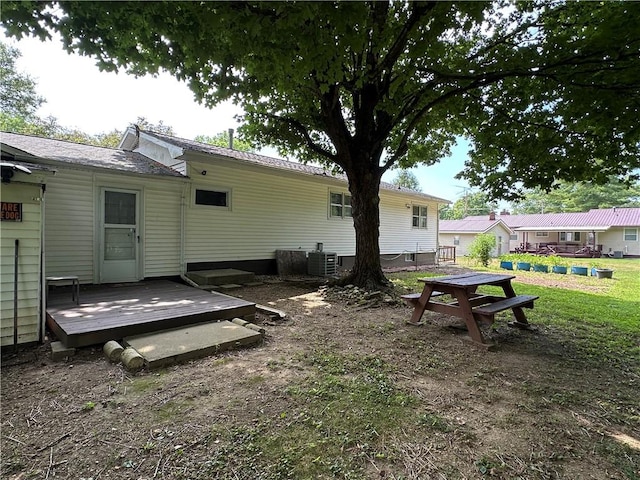 714 Parras St, Danville, IL 61832 - rear view of house featuring a wooden deck