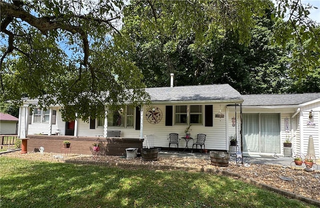 714 Parras St, Danville, IL 61832 - view of front of house featuring a front yard and roof with shingles