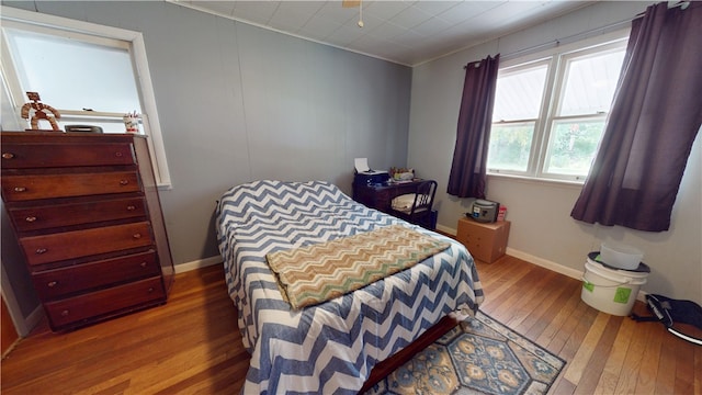 714 Parras St, Danville, IL 61832 - bedroom with wood-type flooring and baseboards