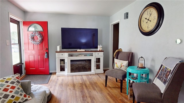 714 Parras St, Danville, IL 61832 - living room with wood finished floors and a fireplace