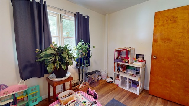 714 Parras St, Danville, IL 61832 - playroom featuring wood finished floors
