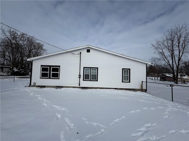 view of snow covered property