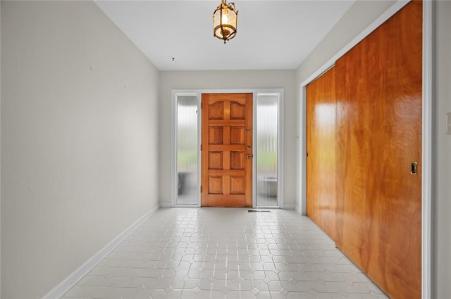 entrance foyer with baseboards