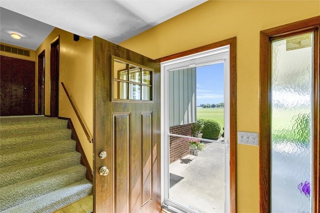 doorway to outside featuring wood-type flooring