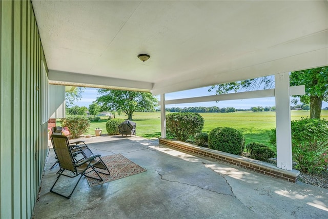 view of patio / terrace with a rural view