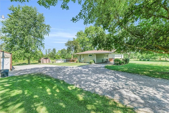 1283 N 1400 E Rd, Shelbyville, IL 62565 - view of front of property featuring a front lawn and driveway