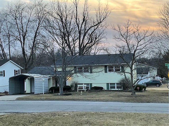 view of front of property with a detached carport