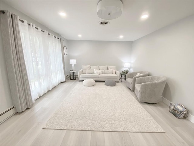 2248 Seneca Dr, Charleston, IL 61920 - living area featuring wood finished floors and recessed lighting