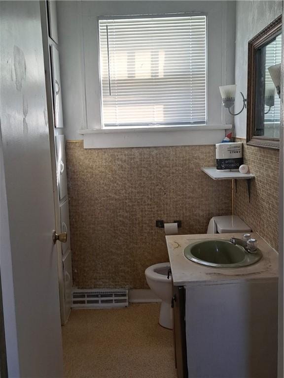 508 S Webster St, Robinson, IL 62454 - bathroom featuring tile walls, vanity, and wainscoting
