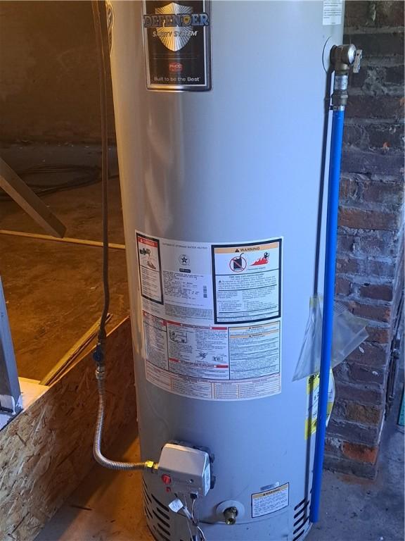 508 S Webster St, Robinson, IL 62454 - utility room with water heater