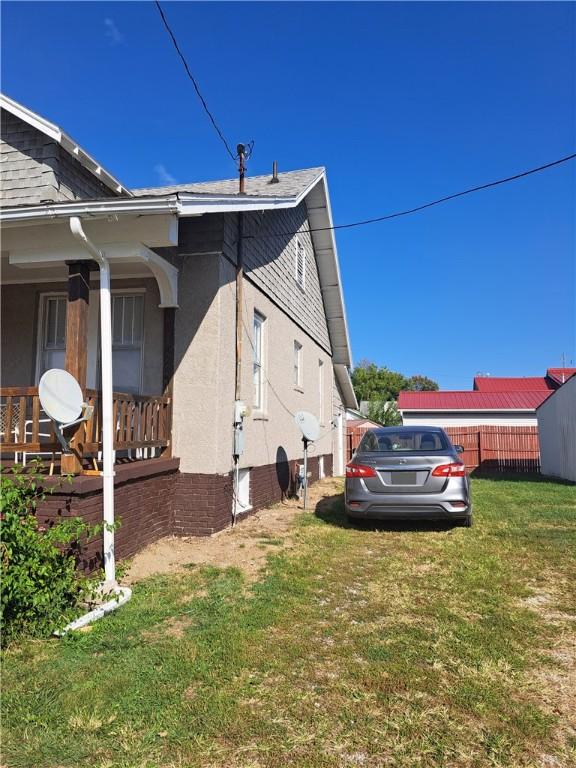 508 S Webster St, Robinson, IL 62454 - view of property exterior featuring stucco siding