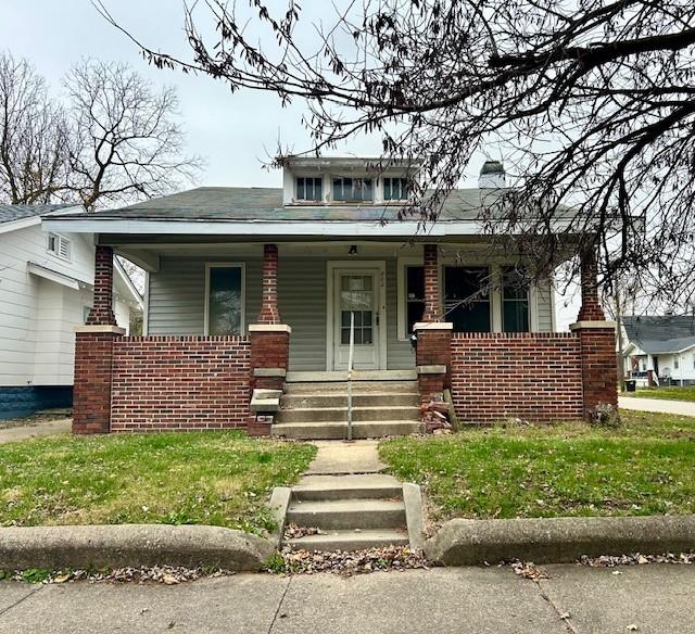 bungalow-style house featuring covered porch