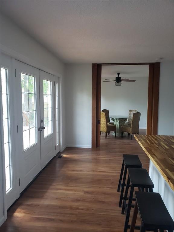 202 S 4th St, Marshall, IL 62441 - dining room featuring french doors, ceiling fan, and dark wood finished floors