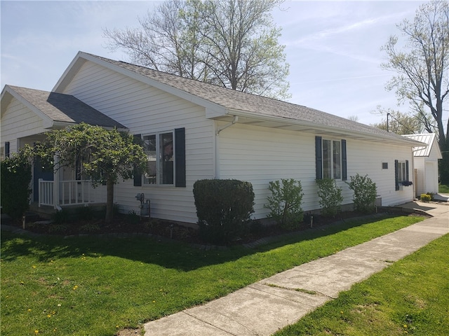 202 S 4th St, Marshall, IL 62441 - view of property exterior with a yard and a shingled roof