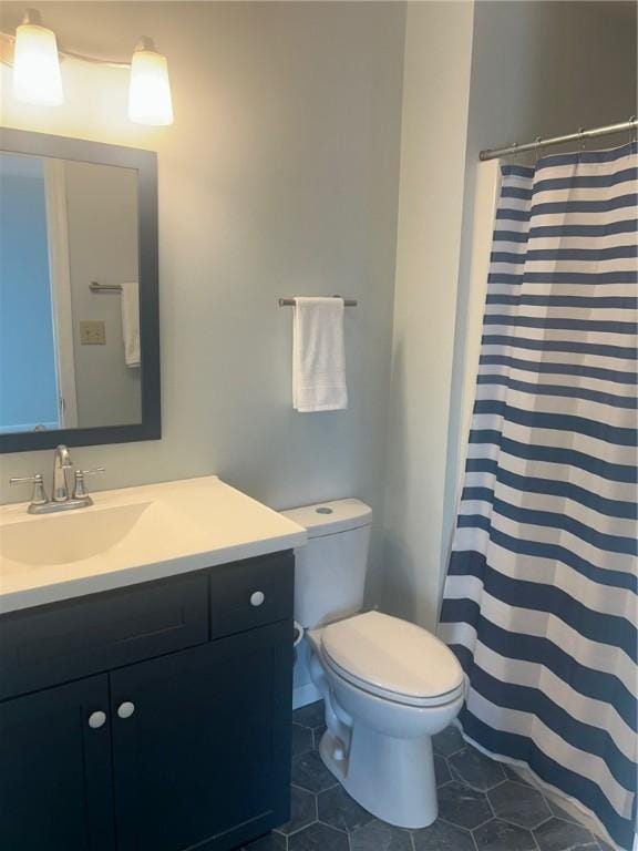 202 S 4th St, Marshall, IL 62441 - full bathroom with vanity, tile patterned floors, and a shower with curtain