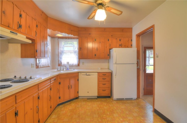 16 Diane Rd, Decatur, IL 62526 - kitchen with white appliances, a sink, under cabinet range hood, and light countertops