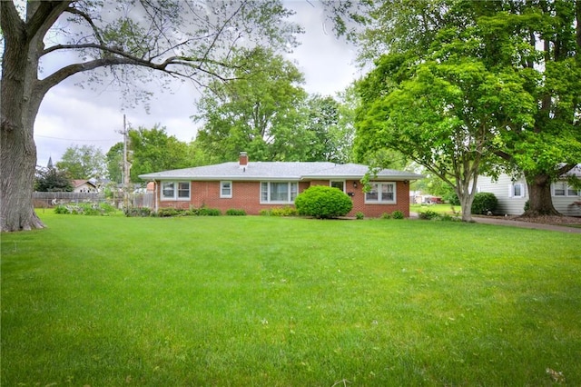 16 Diane Rd, Decatur, IL 62526 - back of house featuring brick siding and a chimney