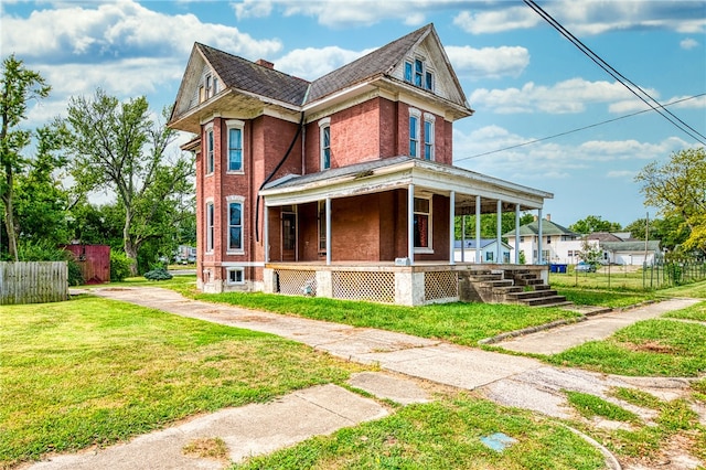 exterior space with a porch and a yard