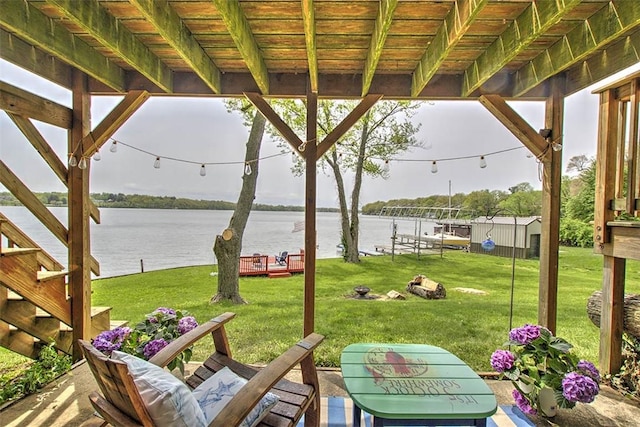 view of patio featuring a water view